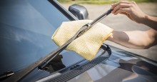 Wipe down windshield wipers for better performance in rain. Clean wipers. Photo ID 75110231 © Nathee Sanbooytho | Dreamstime.com